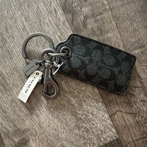 Coach bottle opener keychain